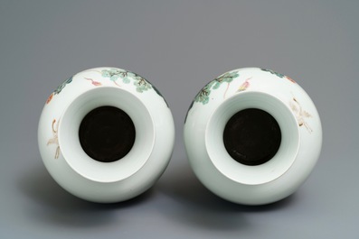A pair of Chinese famille rose vases, Qianlong mark, 20th C.