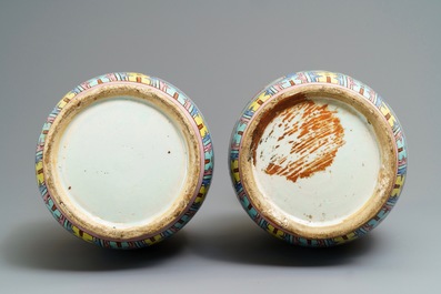 A pair of Chinese famille rose vases, 19th C.