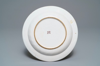 A Holitsch faience famille rose-style chinoiserie plate, Hungary, 18th C.