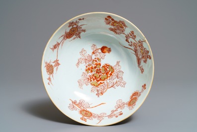 A Chinese iron red and gilt relief-decorated bowl, Kangxi