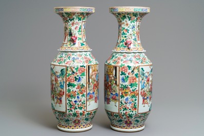 A pair of Chinese famille rose lady-handle vases, 19th C.