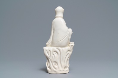 A Chinese Dehua blanc de Chine group of Guanyin with a tiger, 18/19th C.