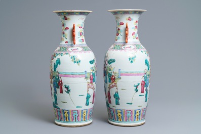 A pair of Chinese famille rose court scene vases, 19th C.