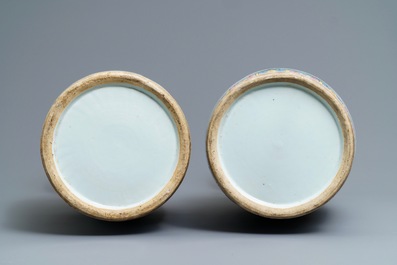 A pair of Chinese famille rose court scene vases, 19th C.
