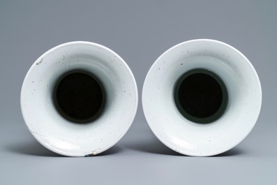 A pair of Chinese famille verte powder blue-ground gu vases, Kangxi mark, 19th C.