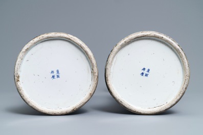 A pair of Chinese famille verte powder blue-ground gu vases, Kangxi mark, 19th C.