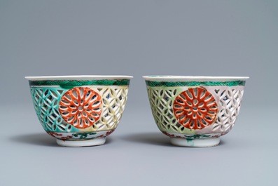 A pair of reticulated double-walled Chinese famille verte cups, Kangxi