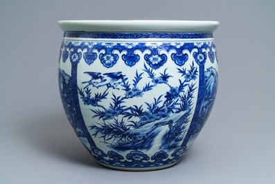 A Chinese blue and white fish bowl with landscape panels, 19th C.