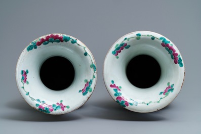 A pair of Chinese famille rose court scene vases, 19th C.