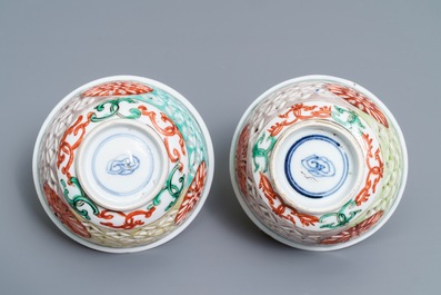 A pair of reticulated double-walled Chinese famille verte cups, Kangxi