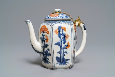 A large Japanese Kakiemon blue and white, iron red and gilt teapot, Edo, 17th C.