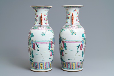 A pair of Chinese famille rose court scene vases, 19th C.