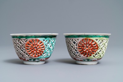 A pair of reticulated double-walled Chinese famille verte cups, Kangxi