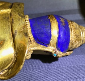 A Sino-Tibetan gilt bronze figure of Jambhala, 19/20th C.