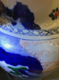 A Chinese wucai baluster vase and cover with playing boys, Transitional period