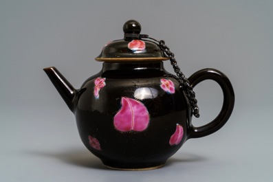 A small Chinese famille rose black-ground teapot and cover, Yongzheng/Qianlong