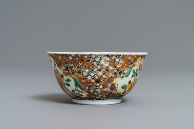 A Chinese famille rose 'pheasant' cup and saucer, Yongzheng