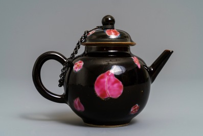 A small Chinese famille rose black-ground teapot and cover, Yongzheng/Qianlong