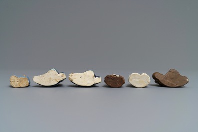 Six Chinese blue, white and celadon biscuit figures, Qianlong