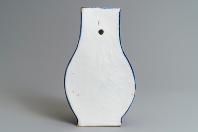 A Dutch Delft blue and white 'putti fountain' wall cistern, 18th C.