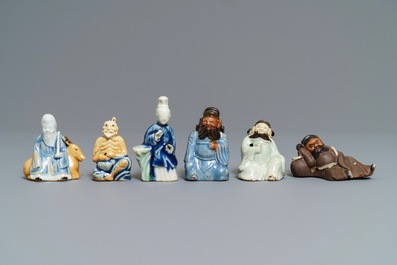 Six Chinese blue, white and celadon biscuit figures, Qianlong