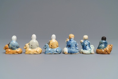 Six Chinese blue, white and celadon biscuit figures, Qianlong