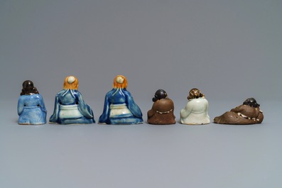 Six Chinese blue, white and celadon biscuit figures, Qianlong
