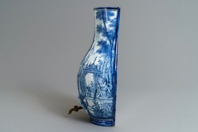 A Dutch Delft blue and white 'putti fountain' wall cistern, 18th C.