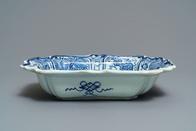 A rectangular Dutch Delft blue and white salad bowl with a peacock, 18th C.