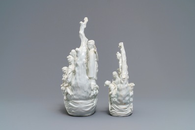 Two Chinese Dehua blanc de Chine groups with immortals on log boats, 19th C.