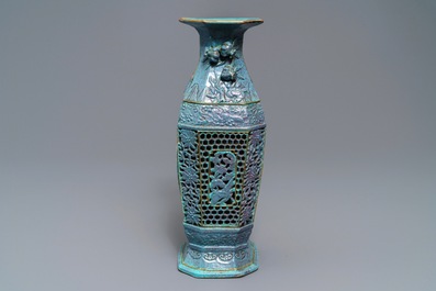 A Chinese reticulated robin's egg-ground qianjiang cai vase, 19th C.