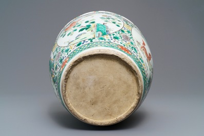 A Chinese famille verte 'mythical beasts' fish bowl, 19th C.
