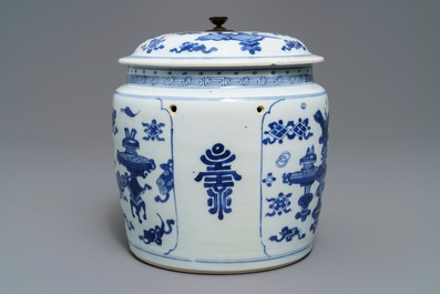 A Chinese blue and white bowl and cover with antiquities design, Kangxi