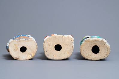 Three Chinese famille rose figures of immortals, 19th C.