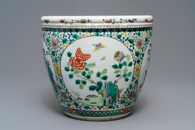 A Chinese famille verte 'mythical beasts' fish bowl, 19th C.