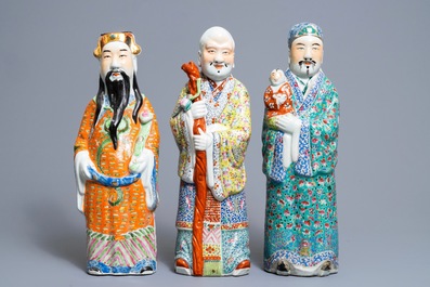 Three Chinese famille rose figures of immortals, 19th C.