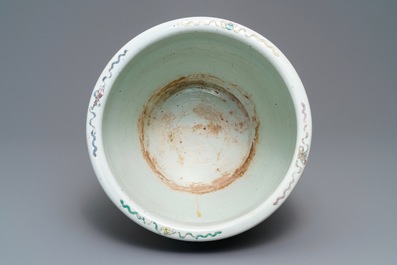 A Chinese famille verte 'mythical beasts' fish bowl, 19th C.