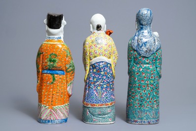 Three Chinese famille rose figures of immortals, 19th C.