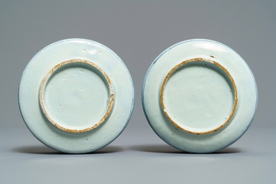 A pair of small Dutch Delft blue and white 'campana' vases on stands, 18th C.