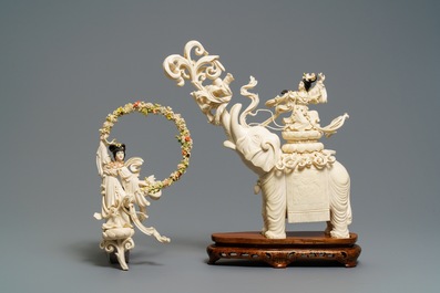 A large Chinese ivory group of an elephant with two ladies, 1st half 20th C.