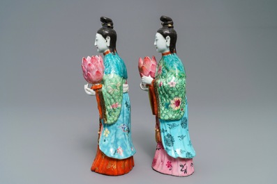 Two Chinese famille rose candle holders modelled as court ladies, Qianlong