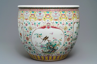 A large Chinese famille rose fish bowl with birds among flowers, 19th C.