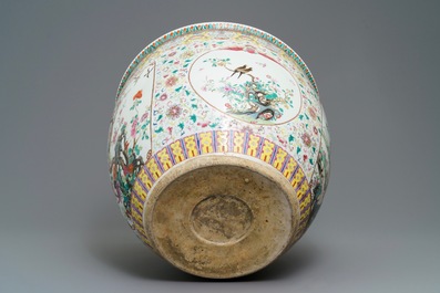 A large Chinese famille rose fish bowl with birds among flowers, 19th C.