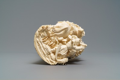 A Chinese carved ivory group with warriors on horseback, 2nd quarter 20th C.