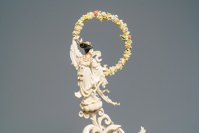 A large Chinese ivory group of an elephant with two ladies, 1st half 20th C.