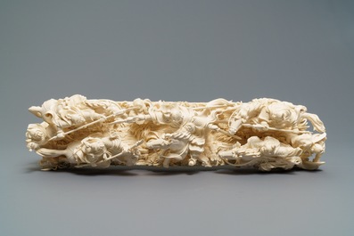 A Chinese carved ivory group with warriors on horseback, 2nd quarter 20th C.