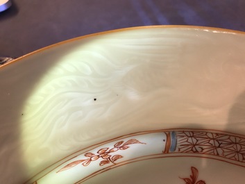 A pair of Chinese iron red and gilt plates with incised underglaze design, Qianlong