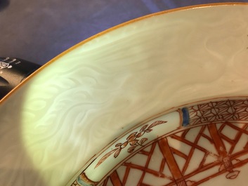 A pair of Chinese iron red and gilt plates with incised underglaze design, Qianlong