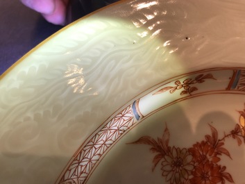 A pair of Chinese iron red and gilt plates with incised underglaze design, Qianlong