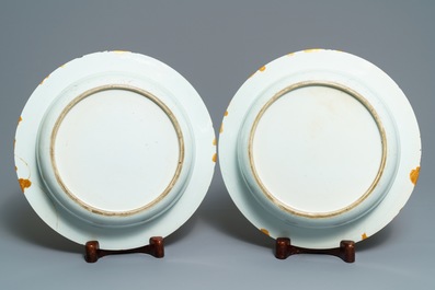 A pair of Chinese blue and white basins with figures in a garden, Yongzheng